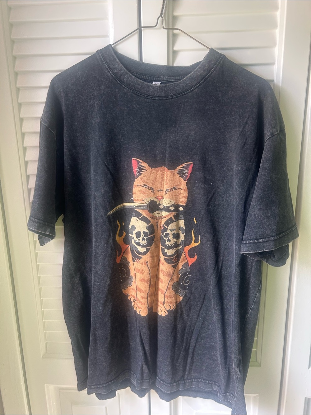 Black Short-Sleeve Graphic Tee with Orange Cat and Skull Design - Unbranded